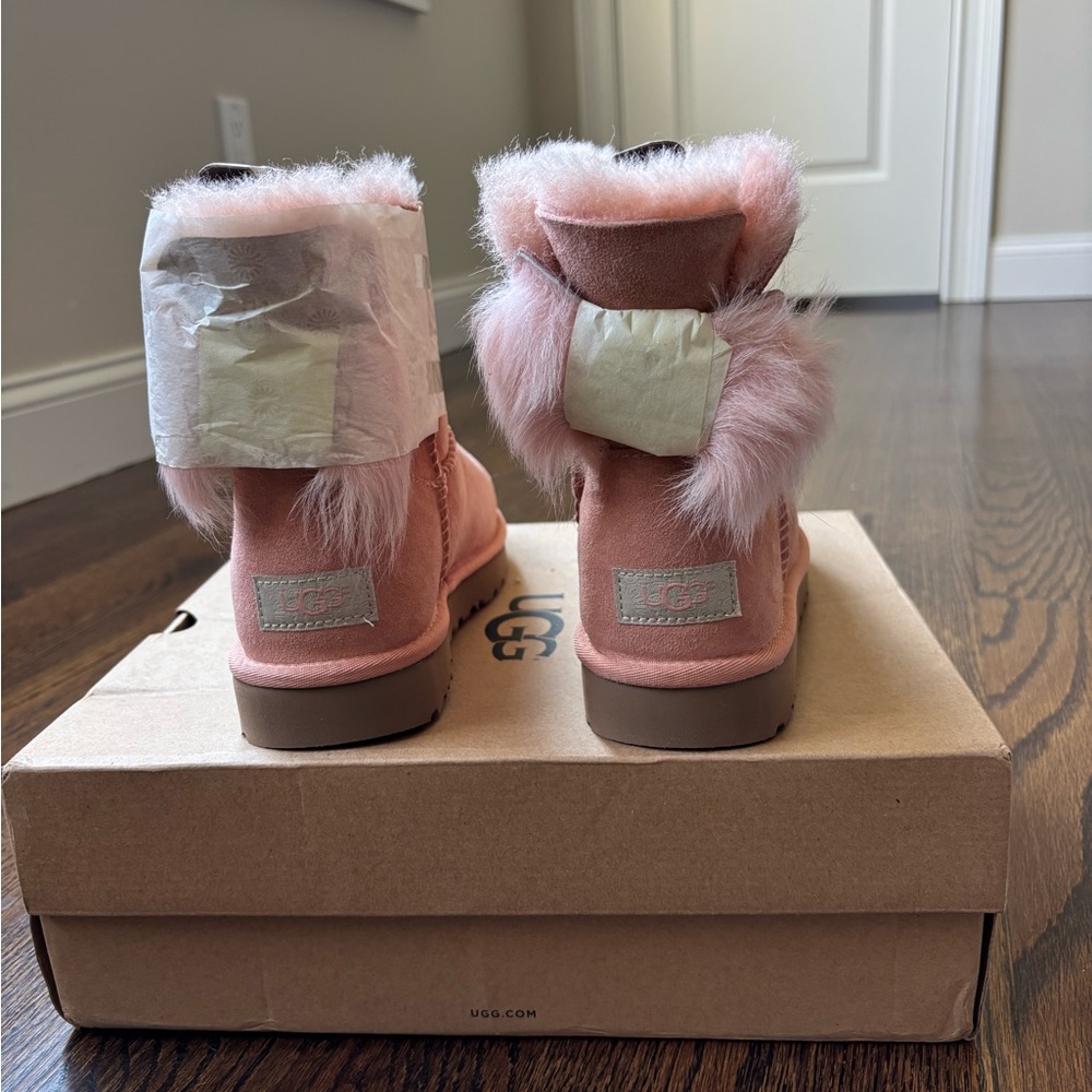 UGG Fluff Bow Mini Boots in Pink